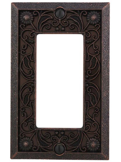 Filigree Single-GFI Switch Plate in Aged Bronze.